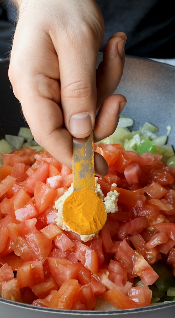 diced onions and green peppers, tomatoes, garlic, turmeric